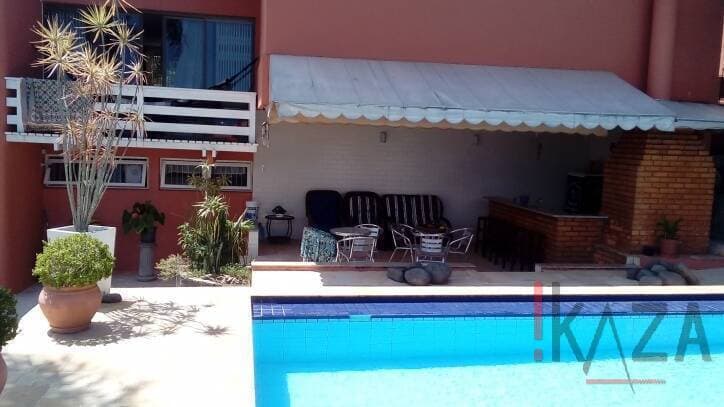Belíssima casa com 4 dormitórios no bairro Itaguaçu — foto 6